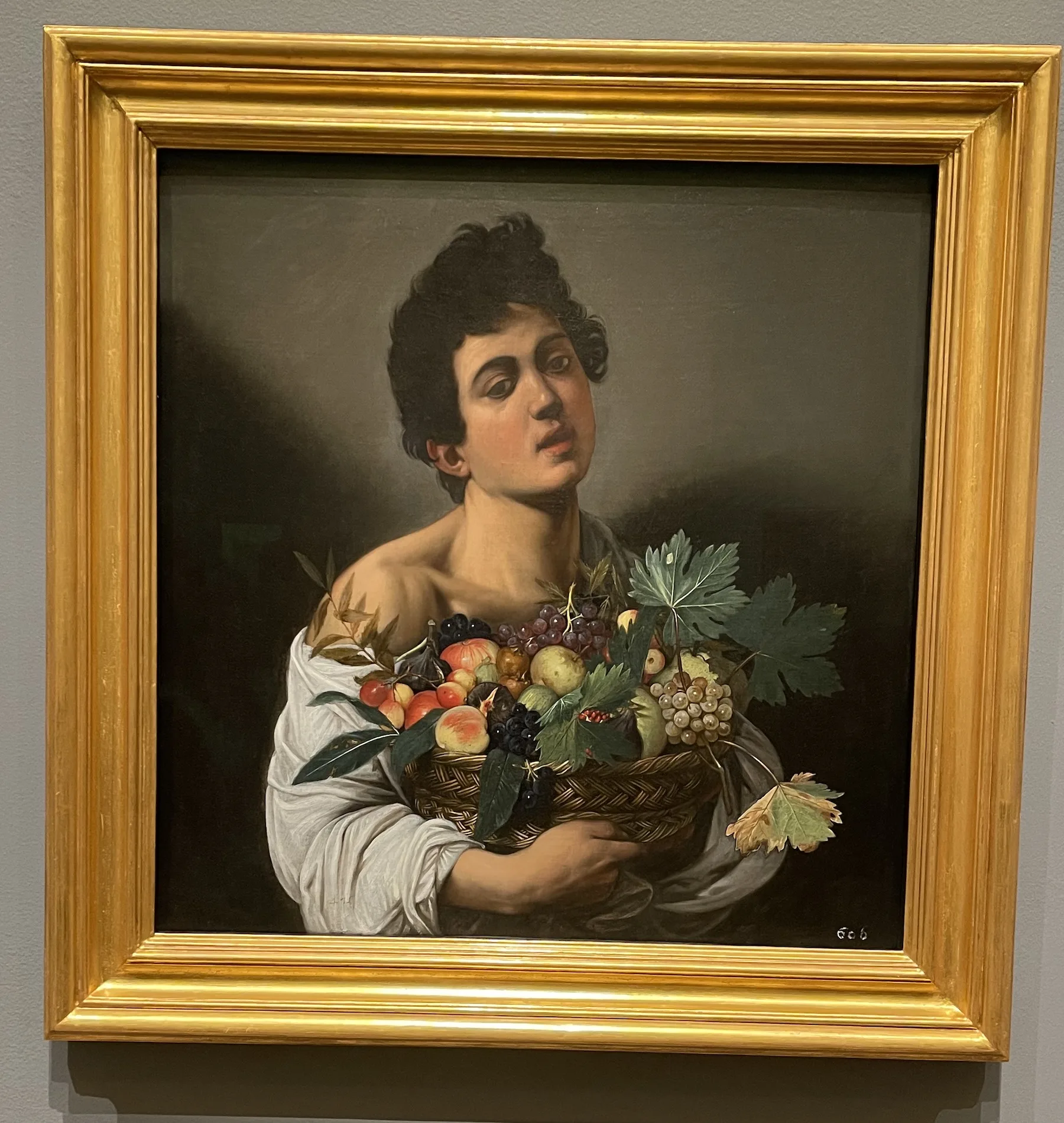 Boy with a fruit basket